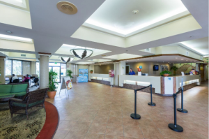 The spacious lobby and front desk at the Maingate Resort located near Disneyworld